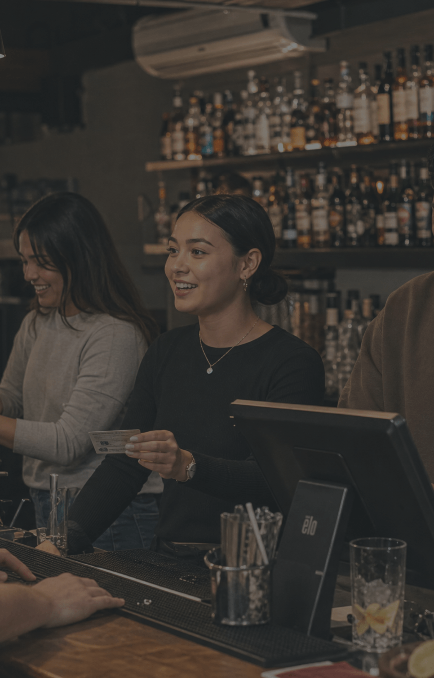 pacific-maori-woman-bartender-id-check-lcq-bar-dark-overlay-nz
